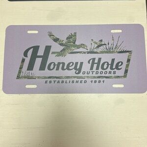 HONEY HOLE OUTDOORS LICENSE PLATE- LIGHT PURPLE